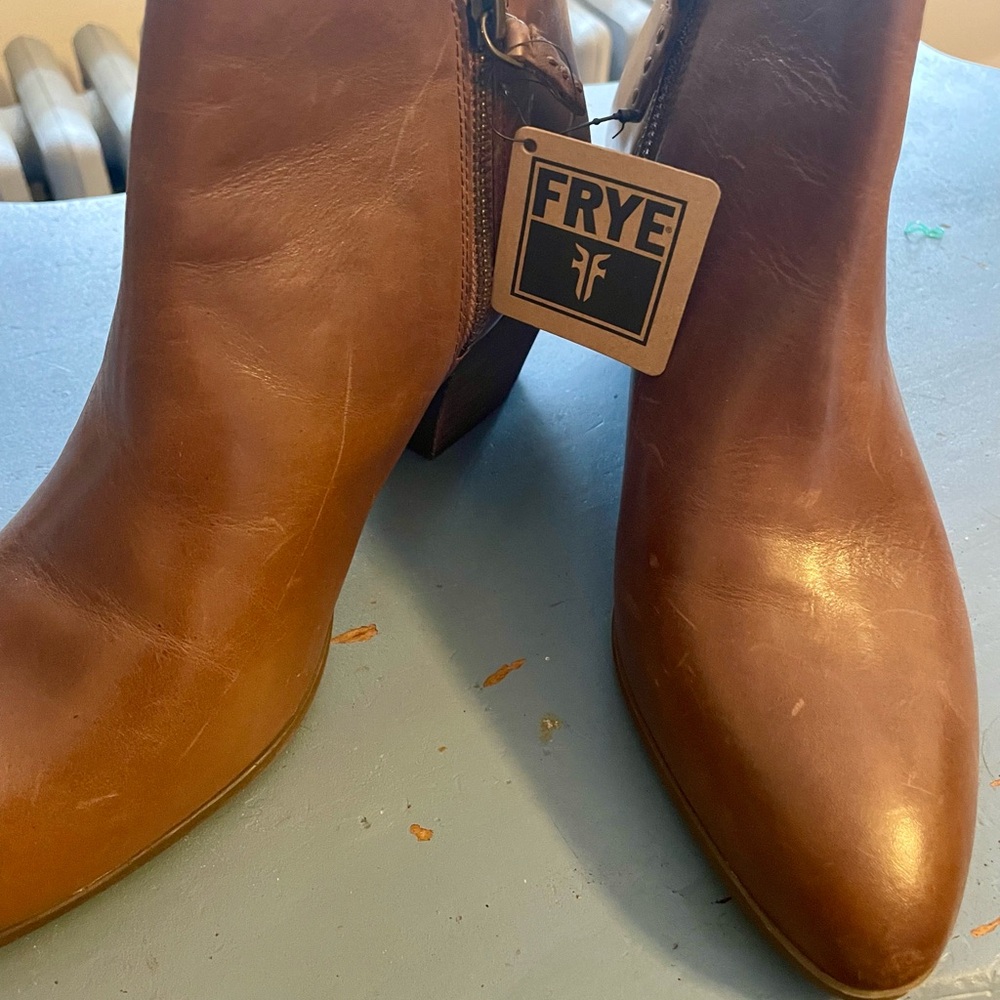 Frye boots never worn, I just tried them around the house.